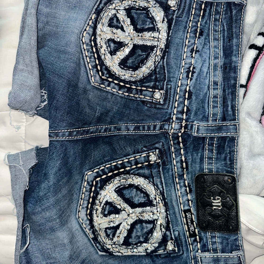 Miss Me Women's Blue Jeans with Peace Sign Embellishment - Picture 2 of 5